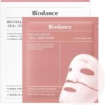 A product photograph of a pair of items from Biodance. In the background is a large, white multi-pack box labeled with the black text "Biodance" at the top, along with partially visible text like "BIO COLLAGEN -REAL DEEP MASK" and "4 SHEETS". Partially obscuring the box in the foreground is an individual sachet in a dusty rose or mauve color. The sachet is clearly labeled in white text with the "Biodance" logo at the top, and "BIO COLLAGEN -REAL DEEP MASK" below it. Text to the right indicates "FACIAL SHEET MASK". Detailed ingredient information is listed, including "Probiotics-Galactomyces Ferment Filtrate", "Low Molecular Hyaluronic Acid Solution", and "Low Molecular Collagen". At the bottom of the sachet, the claims "Hydrating, Pore Perfecting, Firming" are visible, along with the weight "NET WT. 1.19 oz (34 g)". To the front right of the sachet, a separate, white sheet mask is depicted with pink arrows, illustrating a deep-acting and lifting effect. The entire set is presented as a clean product display.